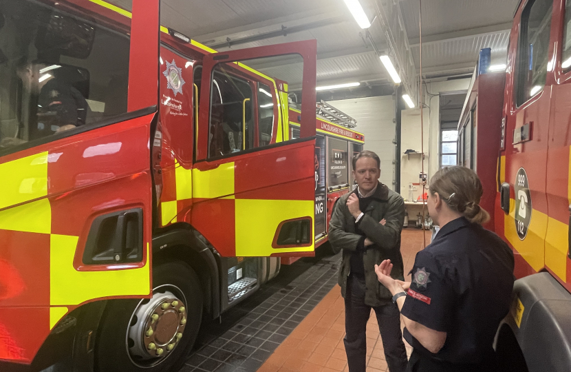 Gareth with a firefighter at Grantham Station