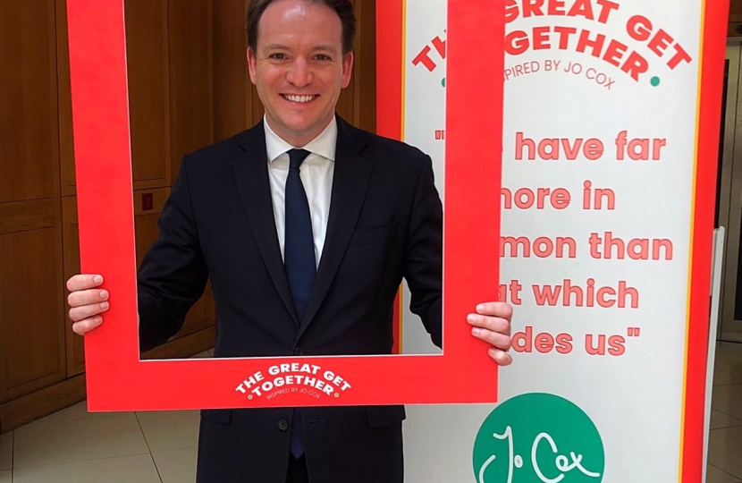 Gareth holding a placard