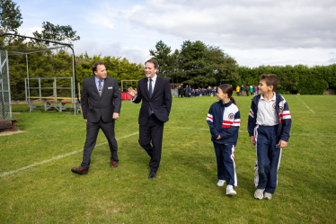 Gareth Davies MP alongside Grantham's Prep's headmaster, head boy, and head girl