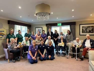 Gareth Davies MP with residents and staff