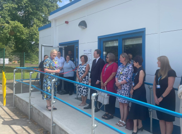 Gareth Davies MP outside the new expansion, alongside local NHS leaders